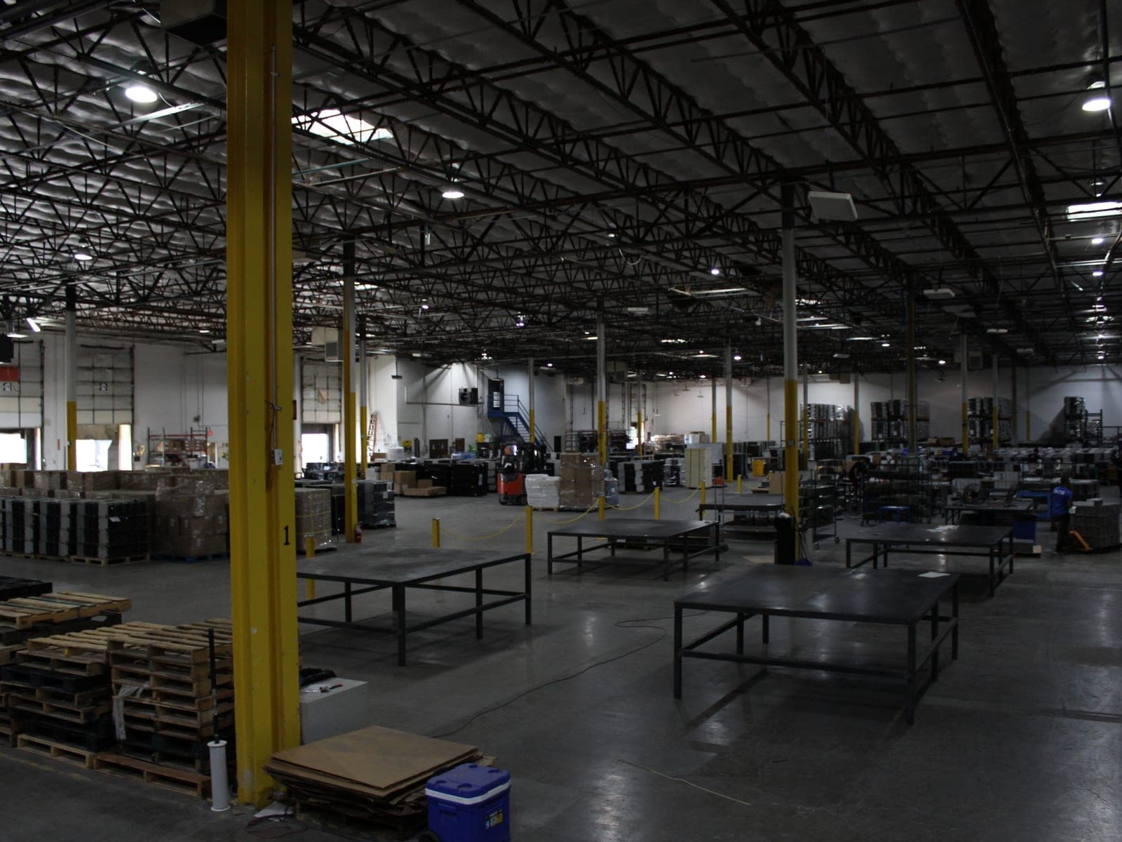 The receiving area of the ACS facility, with dock doors along the far wall
